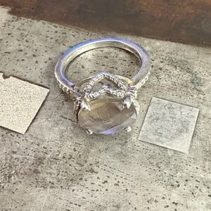 Elegant Sterling Silver Ring w/Gemstone
Handmade vintage hearts circle stone.